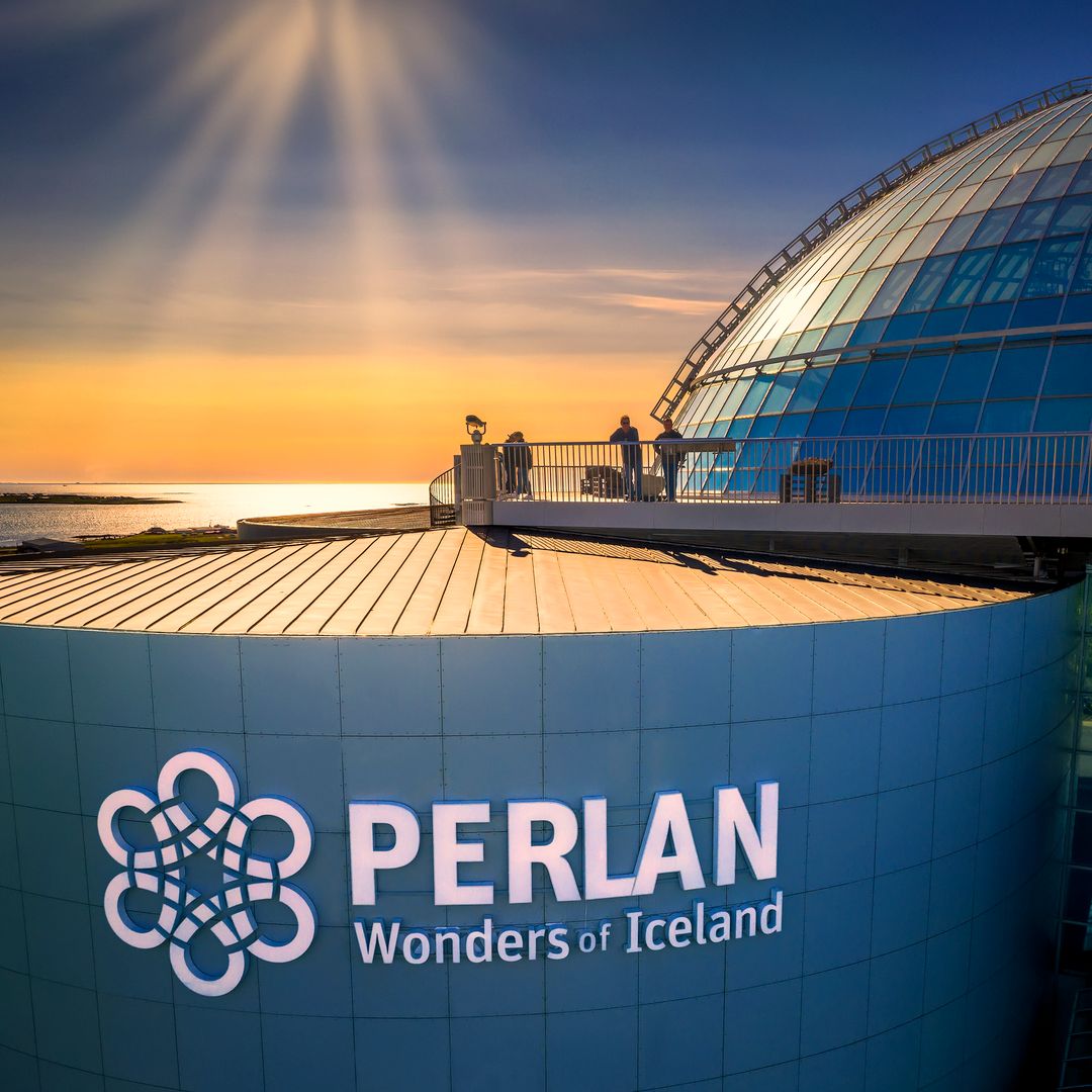 people viewing eclipse on observation deck in reykjavik