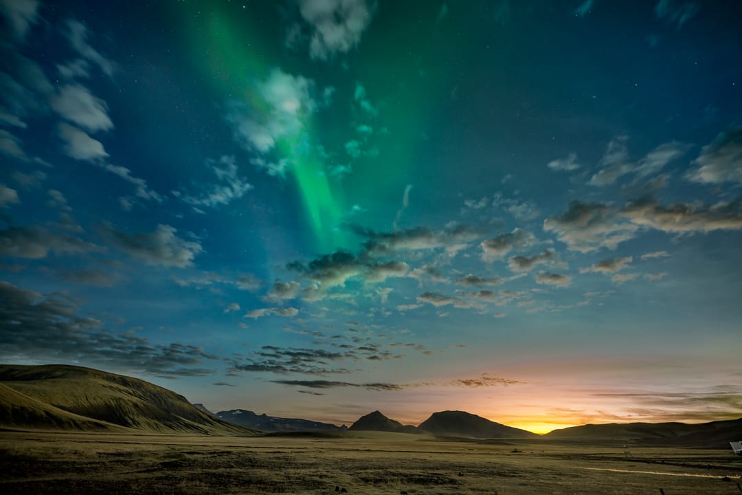Photo of northern lights sunset in Iceland