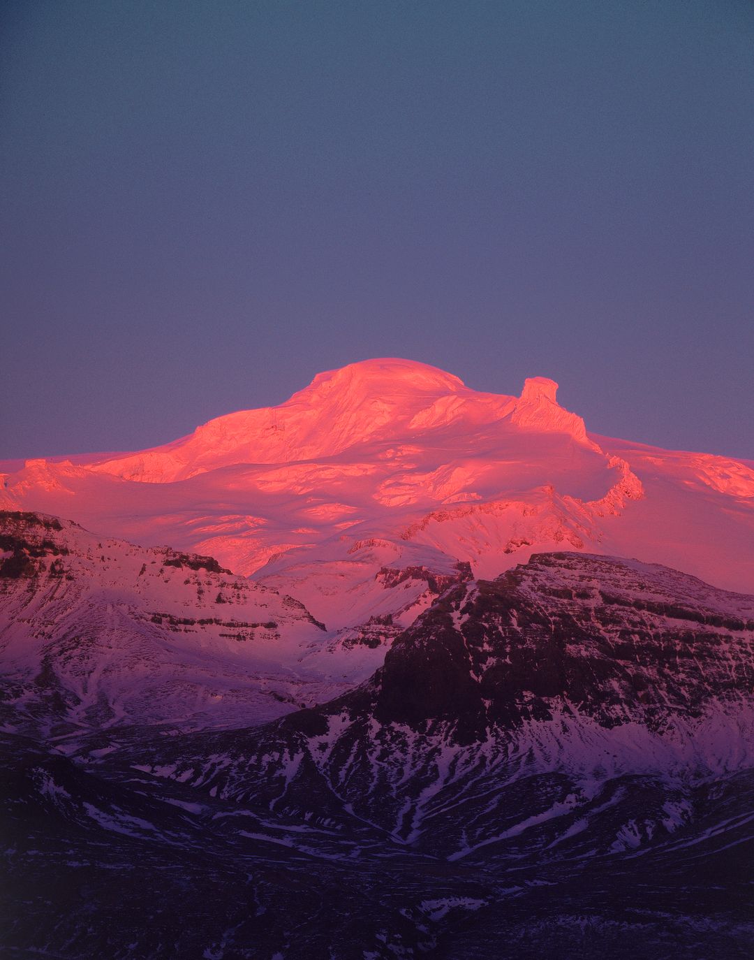 Hvannadalshnúkur during sunset, lit in pink