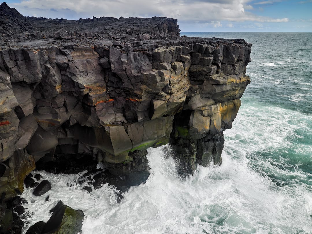 Waves crushing over shores of Surtsey island