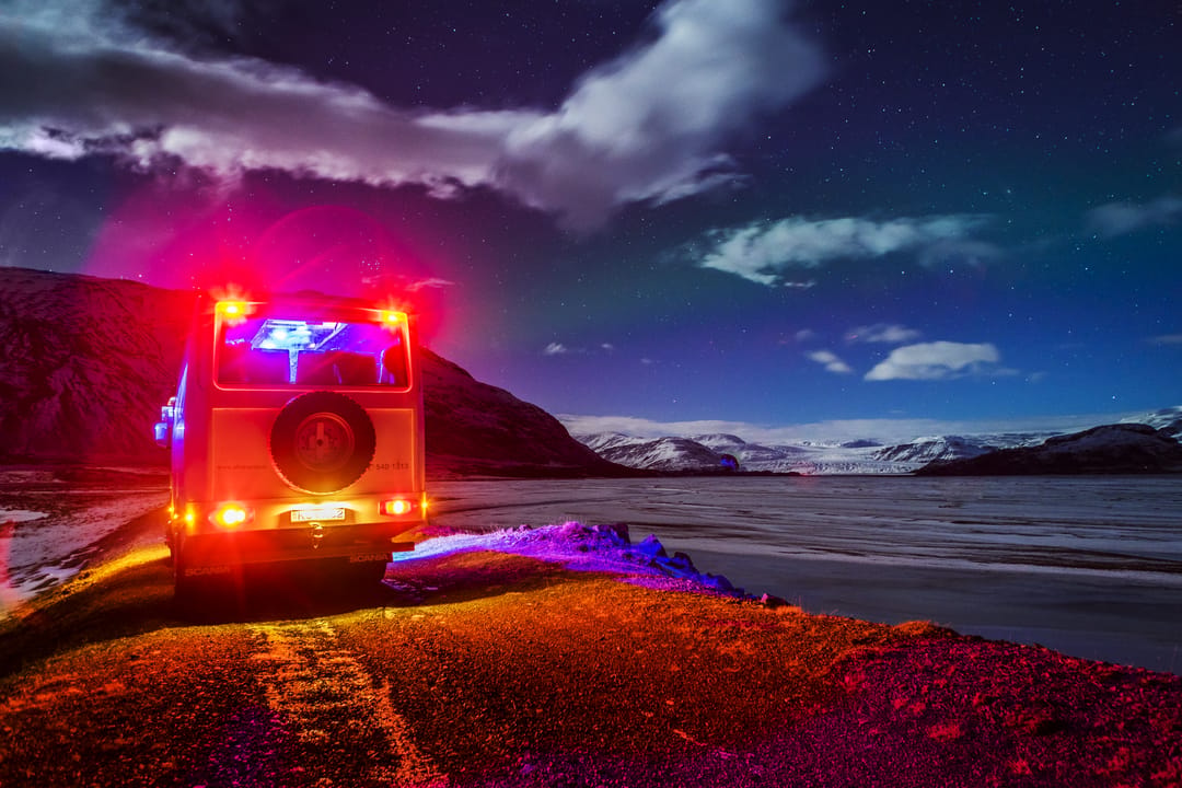 a tourist bus stopped to see a glacier