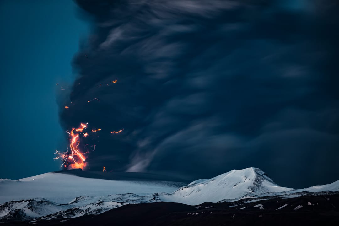 phreatic eruption with lightning and black ash cloud