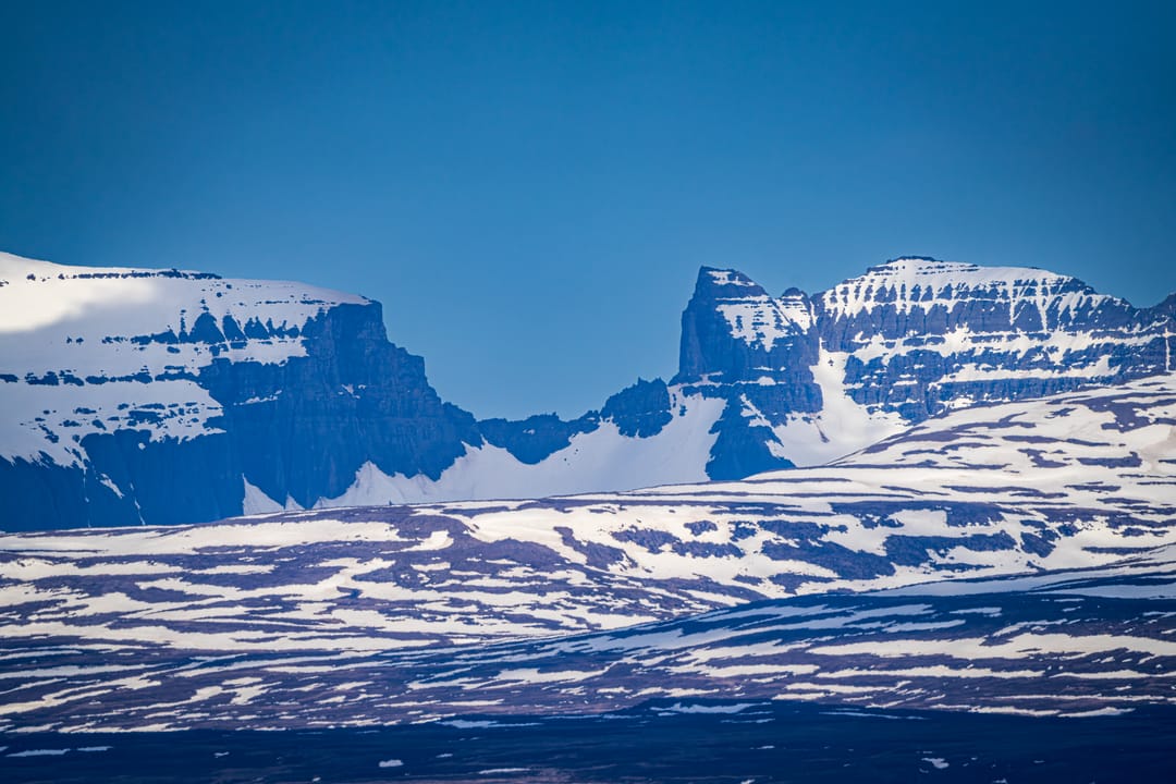 Dyrfjöll mountain range during the winter with snow