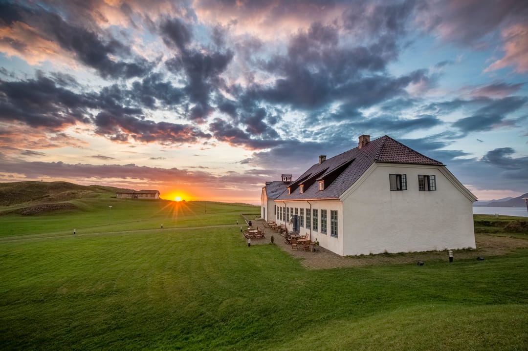 House Viðeyjarstofan, on Viðey at sunset