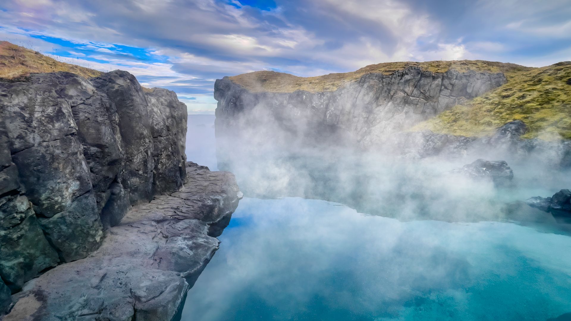 Sky Lagoon between cliffs