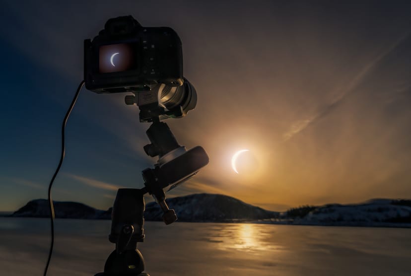 Camera taking a photo of the solar eclipse